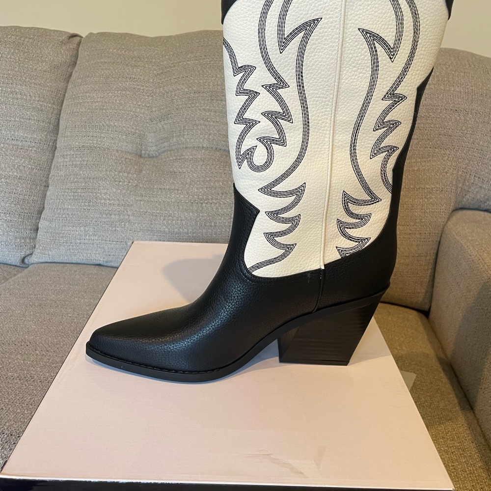 Black and White Heeled Boots with Intricate Stitching
